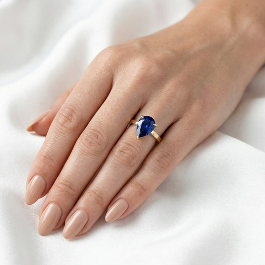 Pear Solitaire Blue Diamond Engagement Ring — Guthrie Jewellery