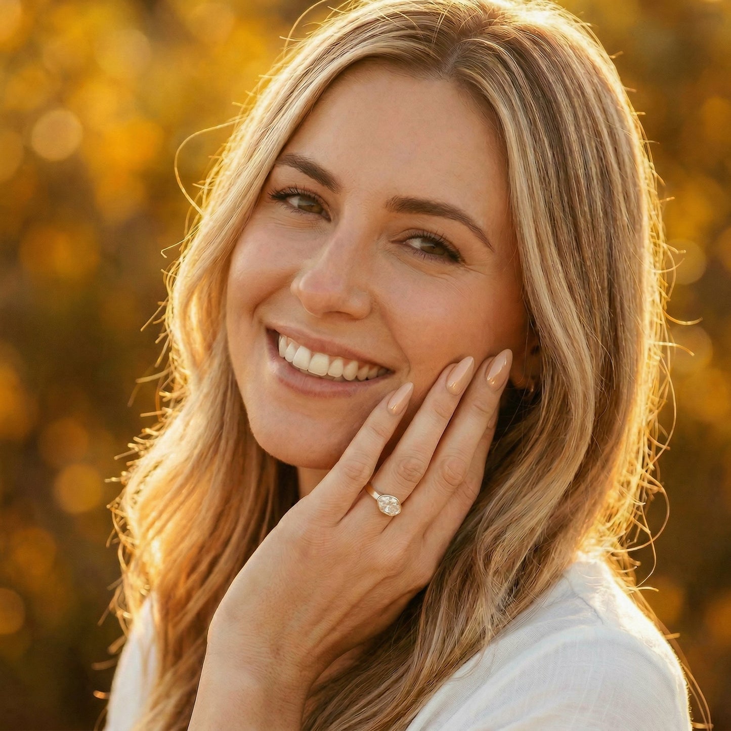 East West Bezel Oval Solitaire Moissanite Engagement Ring