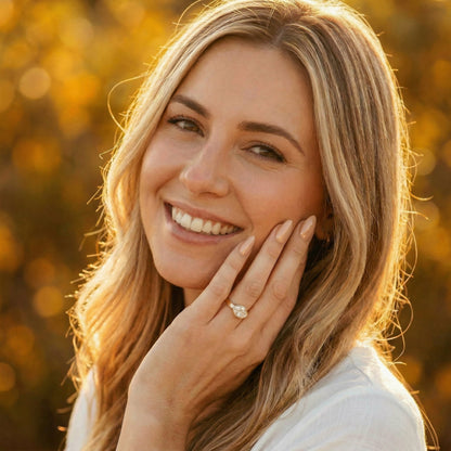 East West Bezel Oval Solitaire Moissanite Engagement Ring