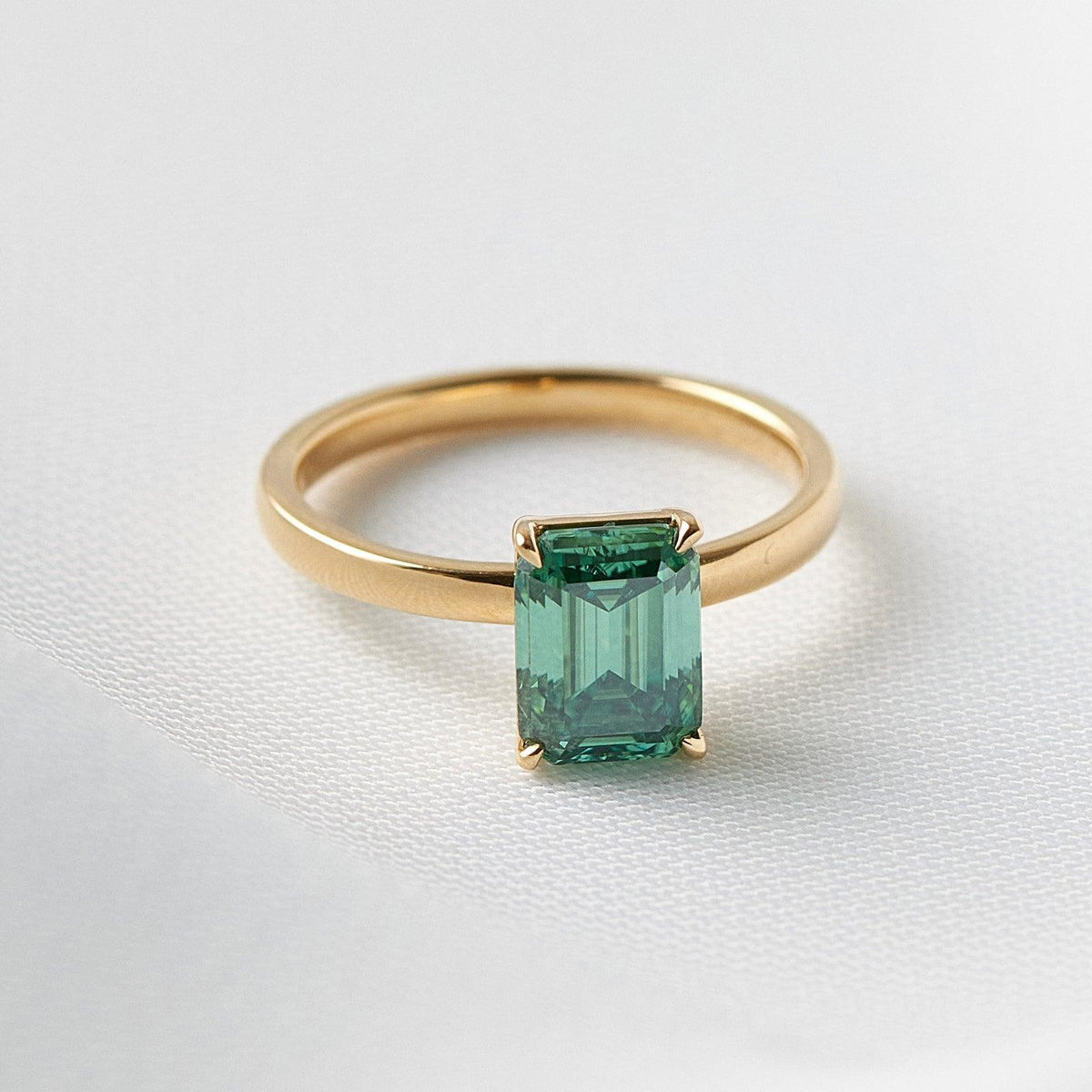 Emerald Cut Emerald Coloured Solitaire Engagement Ring - Guthrie Jewellery