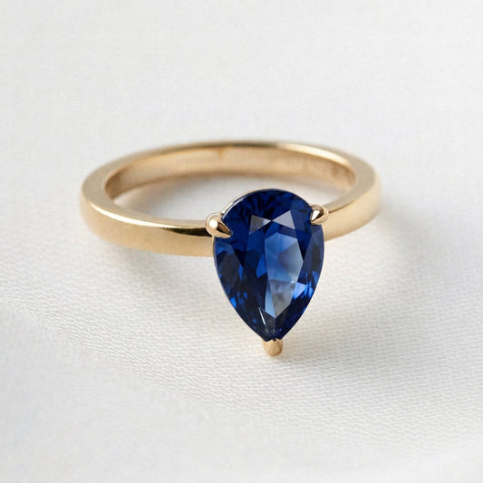 Pear Solitaire Blue Diamond Engagement Ring - Moissanite Engagement Rings